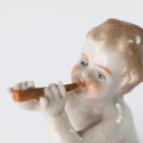 Delicate set of four hand-painted porcelain putti musicians crafted by the Höchst manufactory in Germany, circa 1767–1779. Each figure depicts a different musical instrument and bears the distinctive Höchst wheel mark with radiating spokes. Approx. 1.77 × 1.77 × 1.18 in. A fine example of late Rococo artistry.