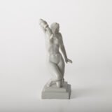 Art Deco porcelain sculpture of Cleopatra kneeling with a snake, in white glazed porcelain by Herend, signed in relief by sculptor Szigethy Nagy István, circa 1930.