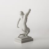 Art Deco porcelain sculpture of Cleopatra kneeling with a snake, in white glazed porcelain by Herend, signed in relief by sculptor Szigethy Nagy István, circa 1930.