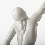 Art Deco porcelain sculpture of Cleopatra kneeling with a snake, in white glazed porcelain by Herend, signed in relief by sculptor Szigethy Nagy István, circa 1930.