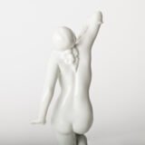 Art Deco porcelain sculpture of Cleopatra kneeling with a snake, in white glazed porcelain by Herend, signed in relief by sculptor Szigethy Nagy István, circa 1930.