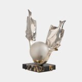 Original French Art Deco table lamp ca. 1930, signed by M. Font on both silvered metal fish figures, with sculptural design, frosted glass globe, and black Portoro marble base with natural golden veining. Measures 12.2 in high, 13.4 in wide, and 4.3 in deep.