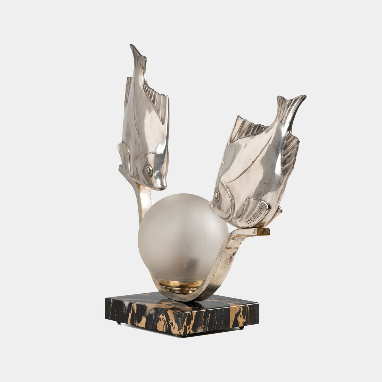 Original French Art Deco table lamp ca. 1930, signed by M. Font on both silvered metal fish figures, with sculptural design, frosted glass globe, and black Portoro marble base with natural golden veining. Measures 12.2 in high, 13.4 in wide, and 4.3 in deep.