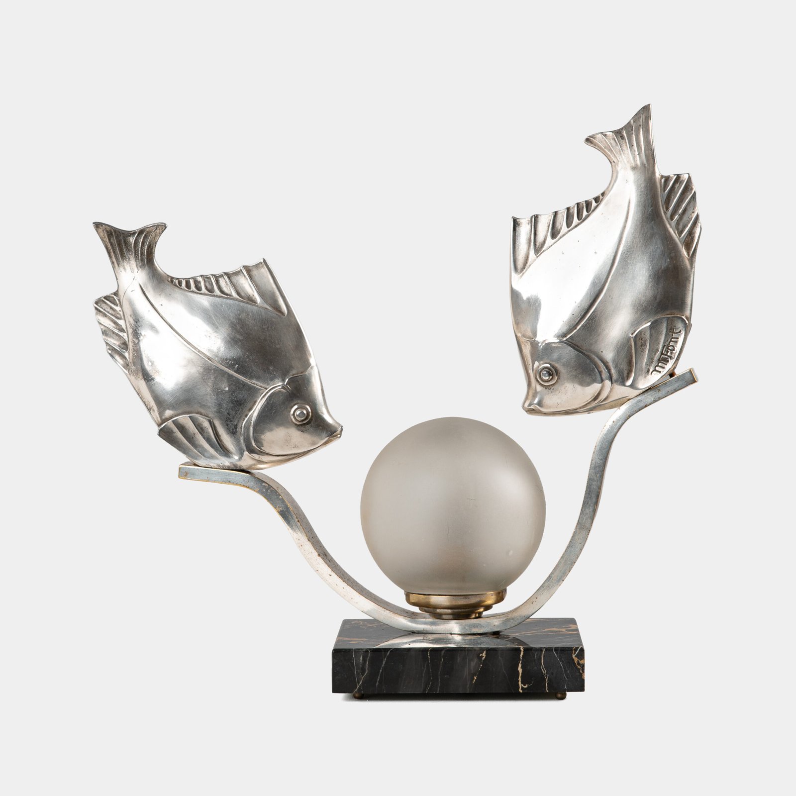 Original French Art Deco table lamp ca. 1930, signed by M. Font on both silvered metal fish figures, with sculptural design, frosted glass globe, and black Portoro marble base with natural golden veining. Measures 12.2 in high, 13.4 in wide, and 4.3 in deep.