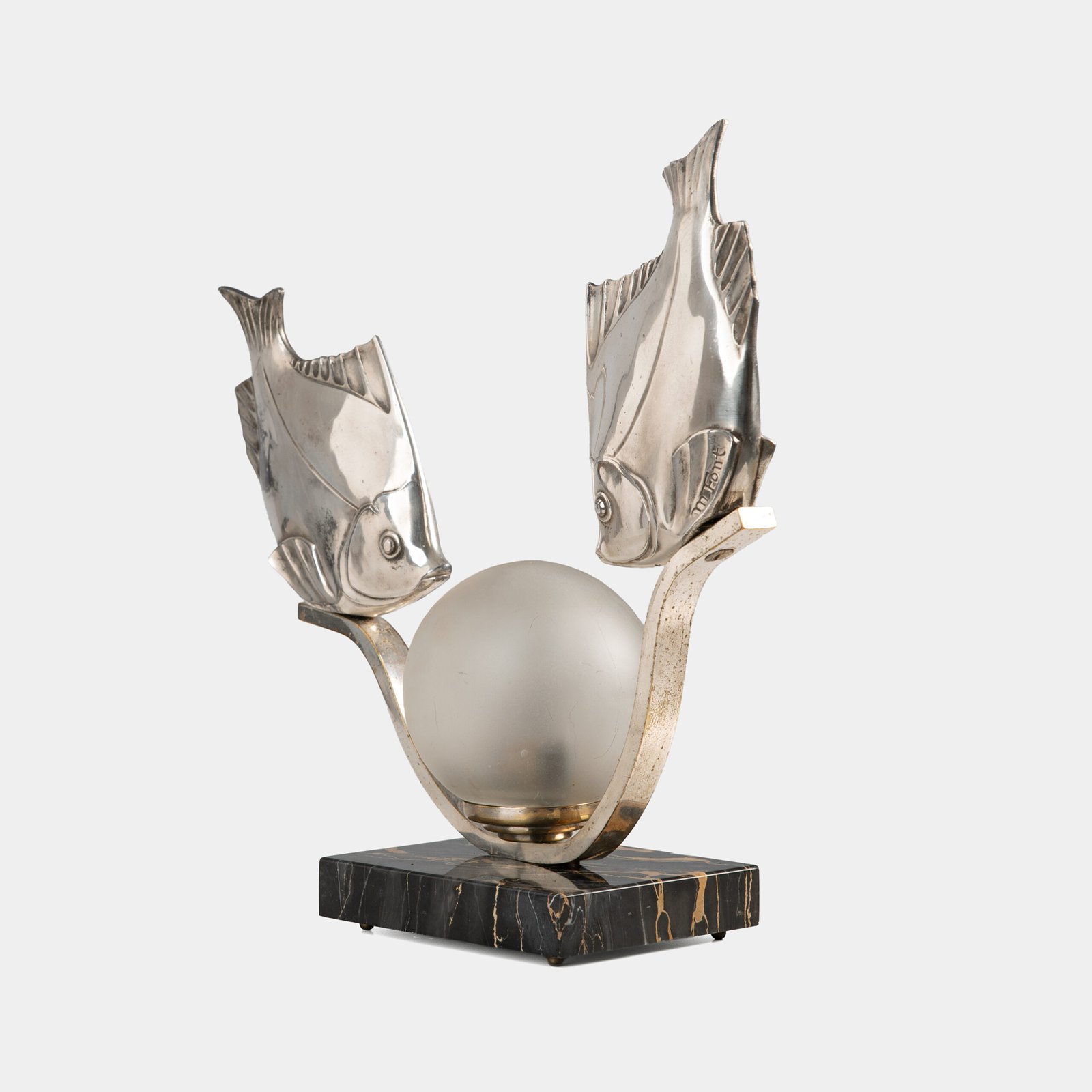Original French Art Deco table lamp ca. 1930, signed by M. Font on both silvered metal fish figures, with sculptural design, frosted glass globe, and black Portoro marble base with natural golden veining. Measures 12.2 in high, 13.4 in wide, and 4.3 in deep.