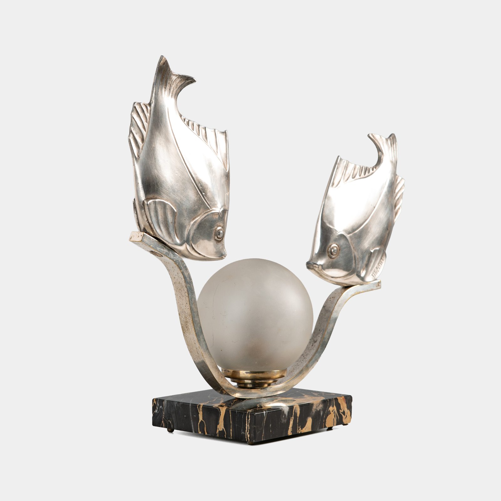 Original French Art Deco table lamp ca. 1930, signed by M. Font on both silvered metal fish figures, with sculptural design, frosted glass globe, and black Portoro marble base with natural golden veining. Measures 12.2 in high, 13.4 in wide, and 4.3 in deep.