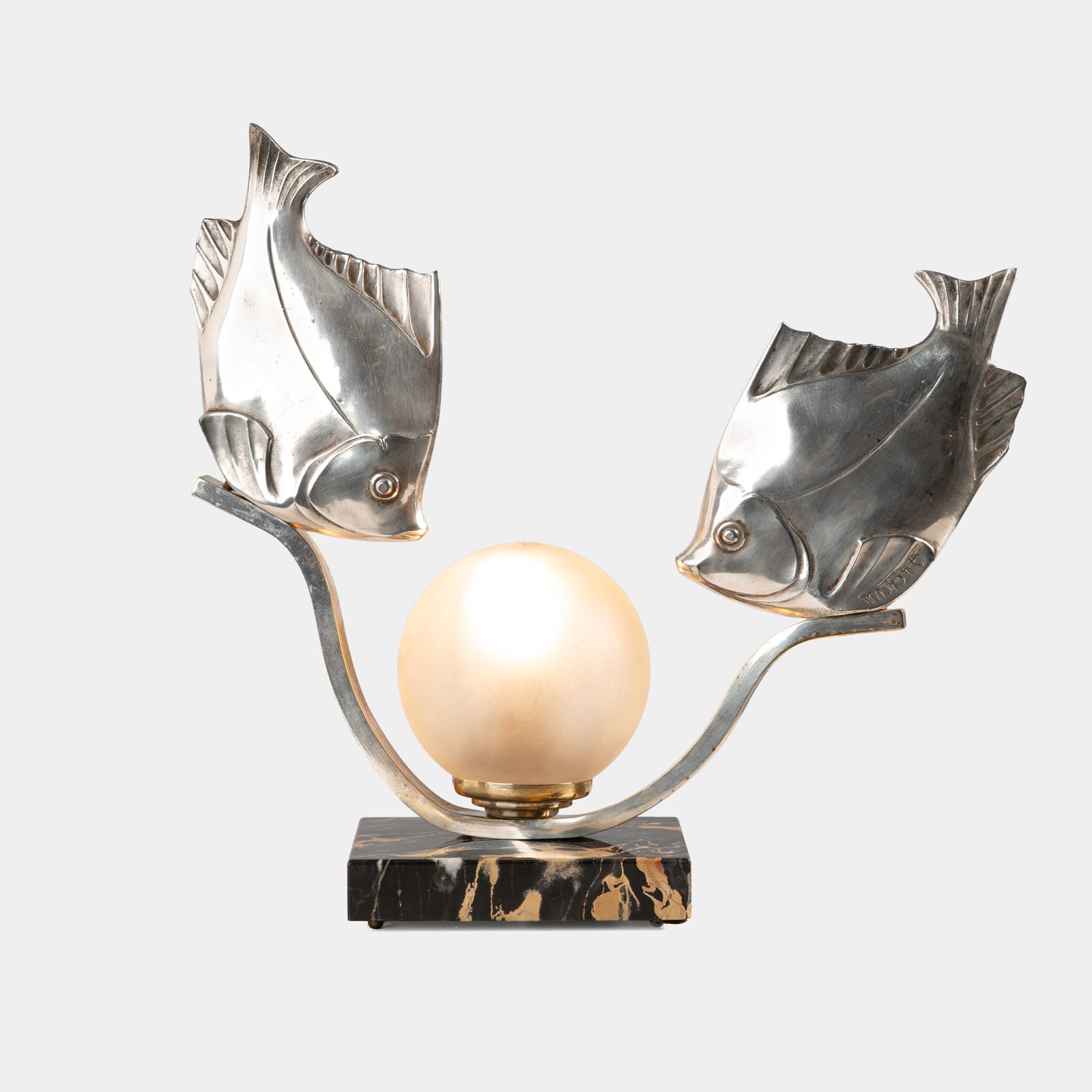Original French Art Deco table lamp ca. 1930, signed by M. Font on both silvered metal fish figures, with sculptural design, frosted glass globe, and black Portoro marble base with natural golden veining. Measures 12.2 in high, 13.4 in wide, and 4.3 in deep.