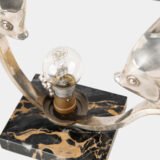 Original French Art Deco table lamp ca. 1930, signed by M. Font on both silvered metal fish figures, with sculptural design, frosted glass globe, and black Portoro marble base with natural golden veining. Measures 12.2 in high, 13.4 in wide, and 4.3 in deep.