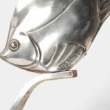 Original French Art Deco table lamp ca. 1930, signed by M. Font on both silvered metal fish figures, with sculptural design, frosted glass globe, and black Portoro marble base with natural golden veining. Measures 12.2 in high, 13.4 in wide, and 4.3 in deep.