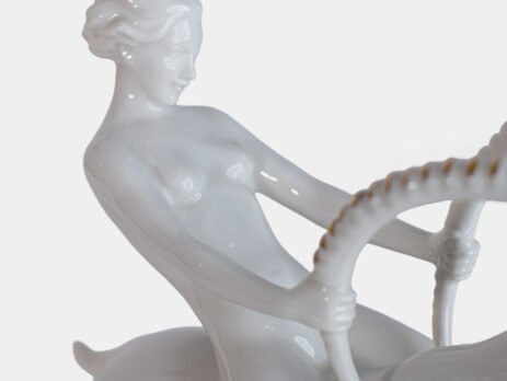 Max Fritz sculpture – Art Deco porcelain by Hutschenreuther Selb, Germany (1925–1935) Glazed white porcelain sculpture signed by Max Hermann Fritz and produced by Hutschenreuther Selb between 1925 and 1935. Depicts a nude female figure riding a leaping ibex, with hand-applied gilding on the horns, eyes, hooves, and base. German Art Deco style.