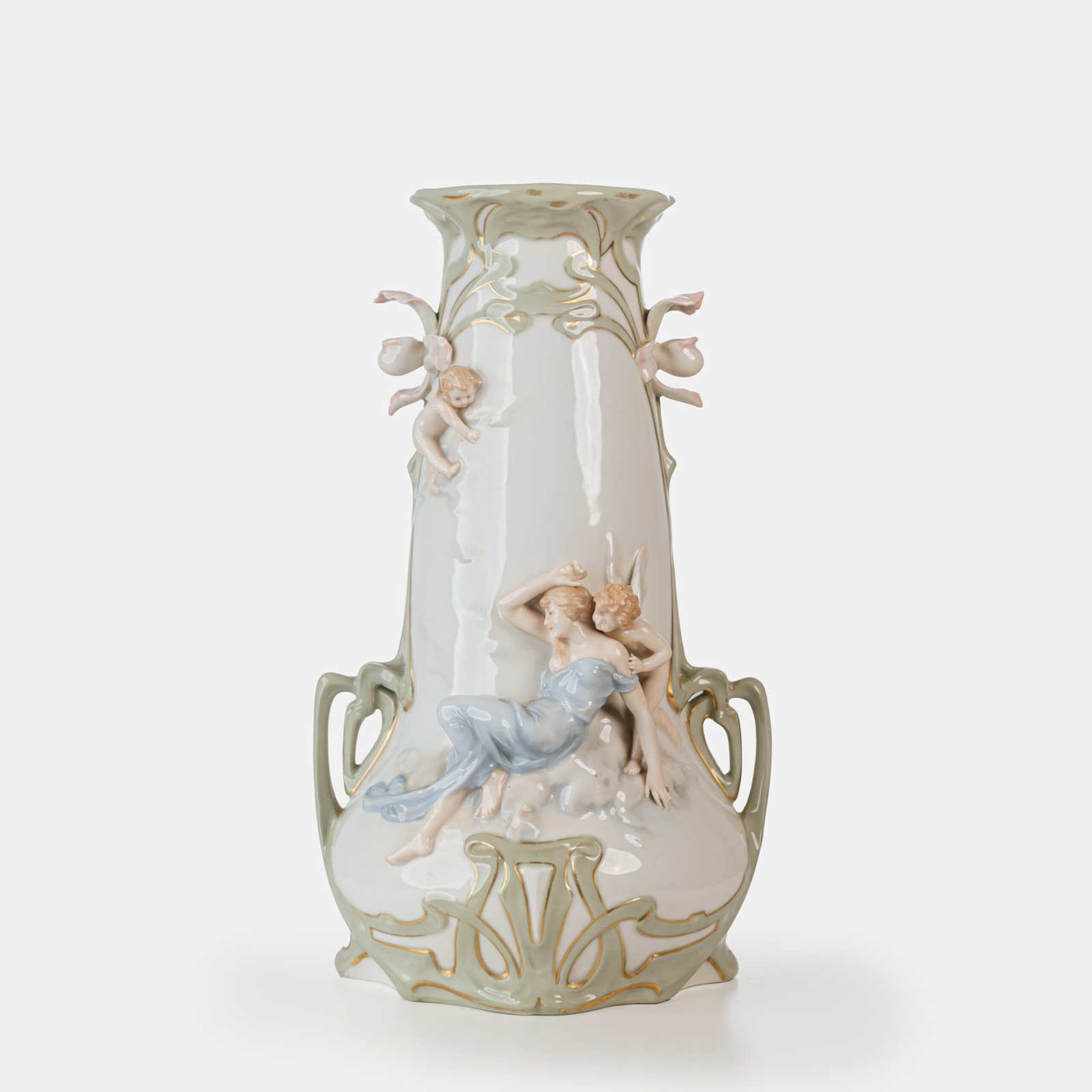 Art Nouveau porcelain vase by Karl Ens, circa 1900, featuring a sculptural composition in high relief with a maiden and cherub, hand-painted with floral details and highlighted with gilding. Marked “KVE” on the base.