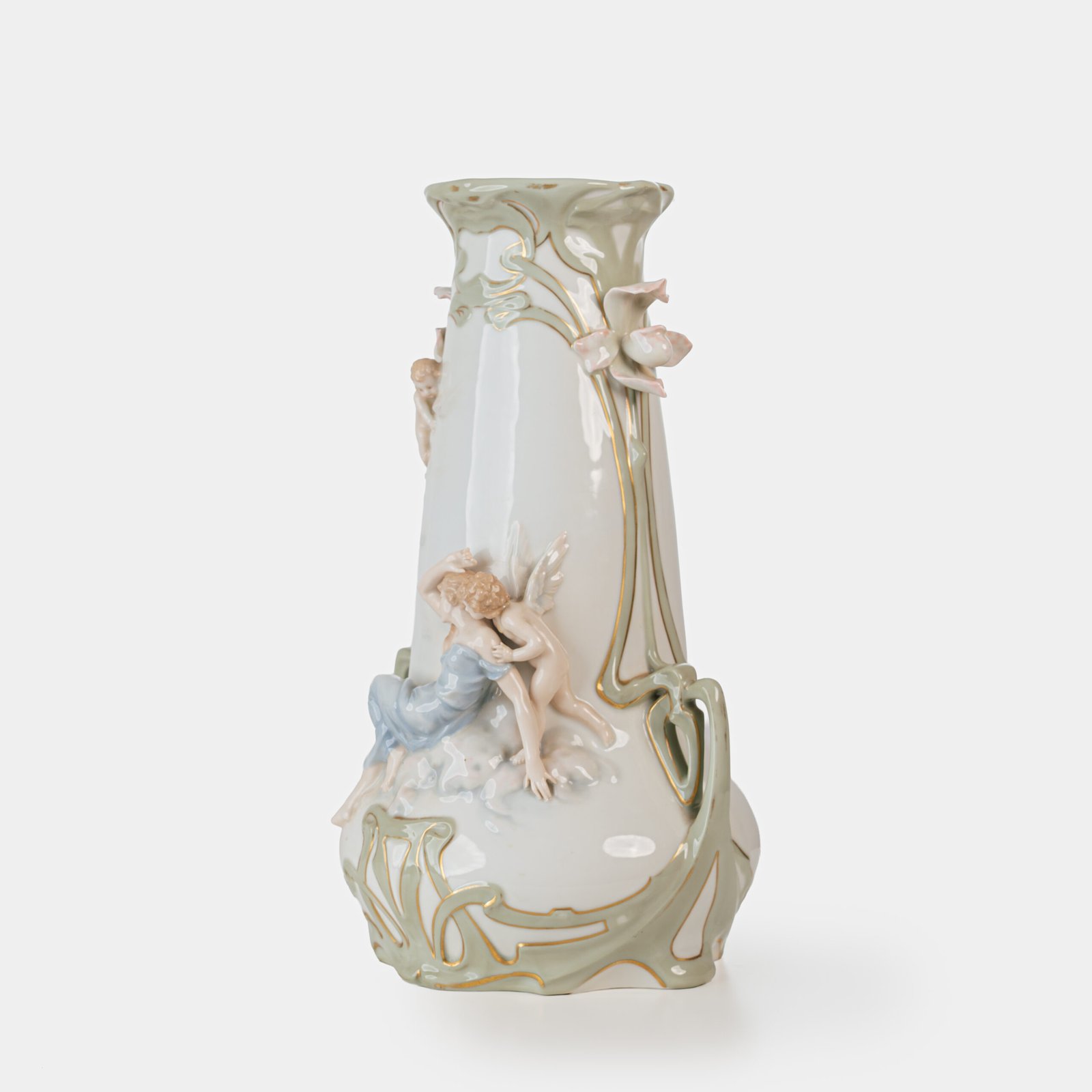Art Nouveau porcelain vase by Karl Ens, circa 1900, featuring a sculptural composition in high relief with a maiden and cherub, hand-painted with floral details and highlighted with gilding. Marked “KVE” on the base.