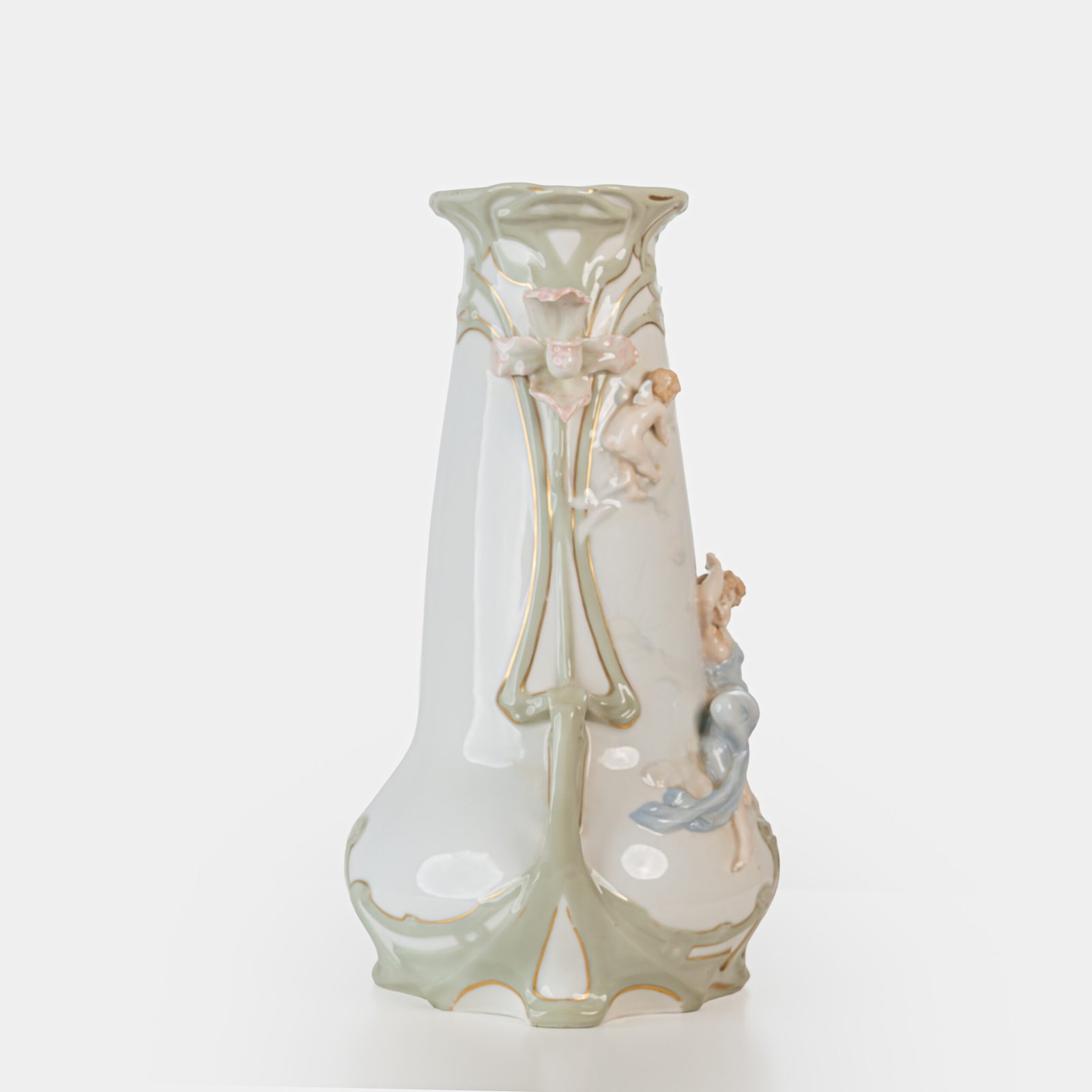Art Nouveau porcelain vase by Karl Ens, circa 1900, featuring a sculptural composition in high relief with a maiden and cherub, hand-painted with floral details and highlighted with gilding. Marked “KVE” on the base.