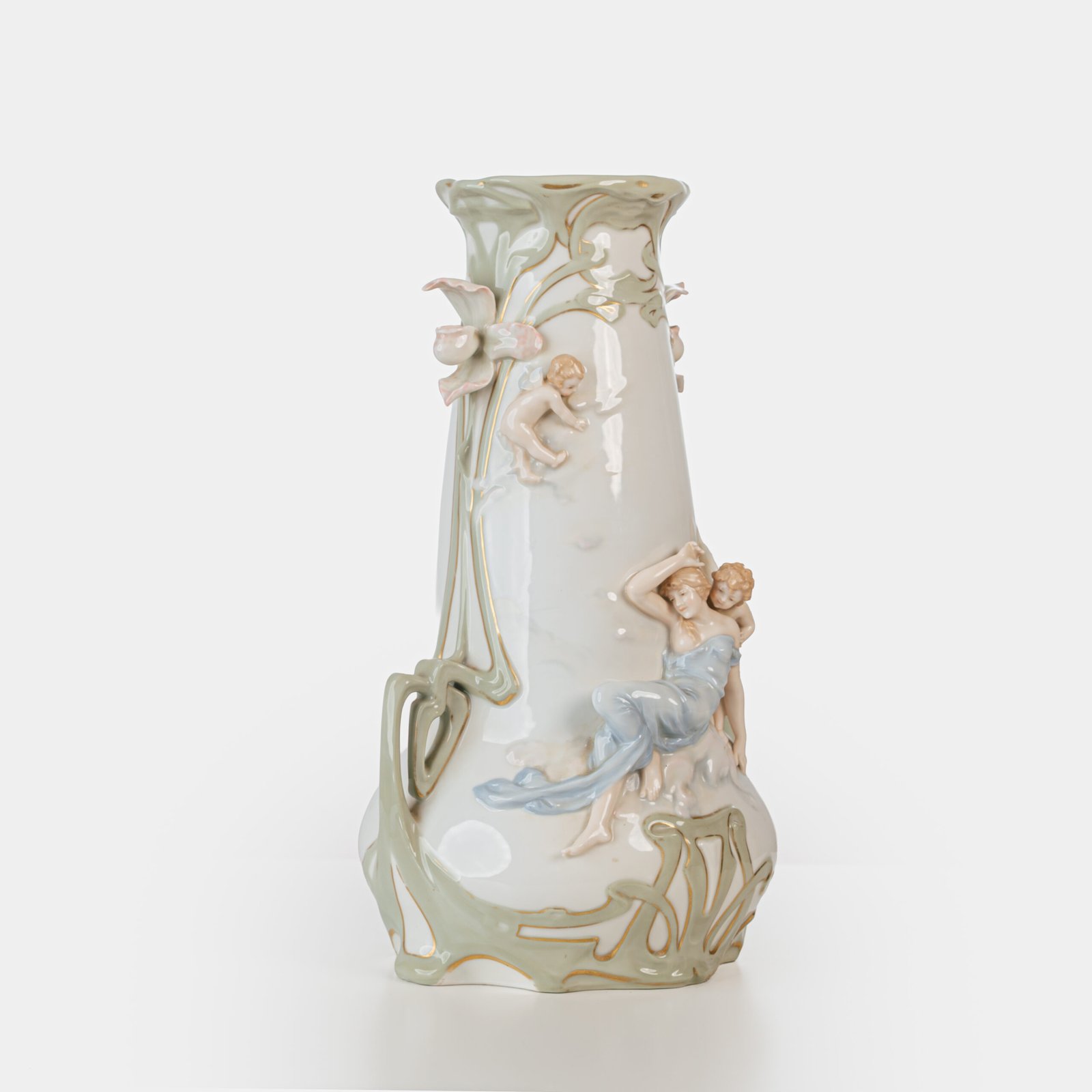 Art Nouveau porcelain vase by Karl Ens, circa 1900, featuring a sculptural composition in high relief with a maiden and cherub, hand-painted with floral details and highlighted with gilding. Marked “KVE” on the base.