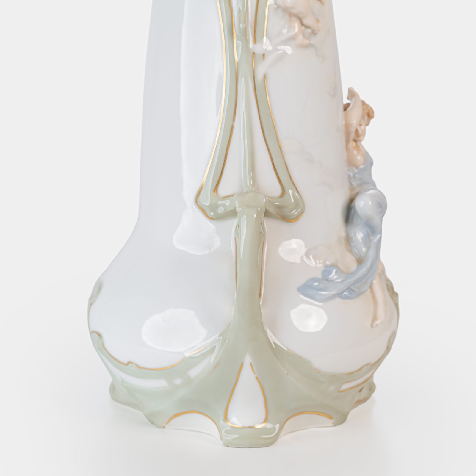 Art Nouveau porcelain vase by Karl Ens, circa 1900, featuring a sculptural composition in high relief with a maiden and cherub, hand-painted with floral details and highlighted with gilding. Marked “KVE” on the base.