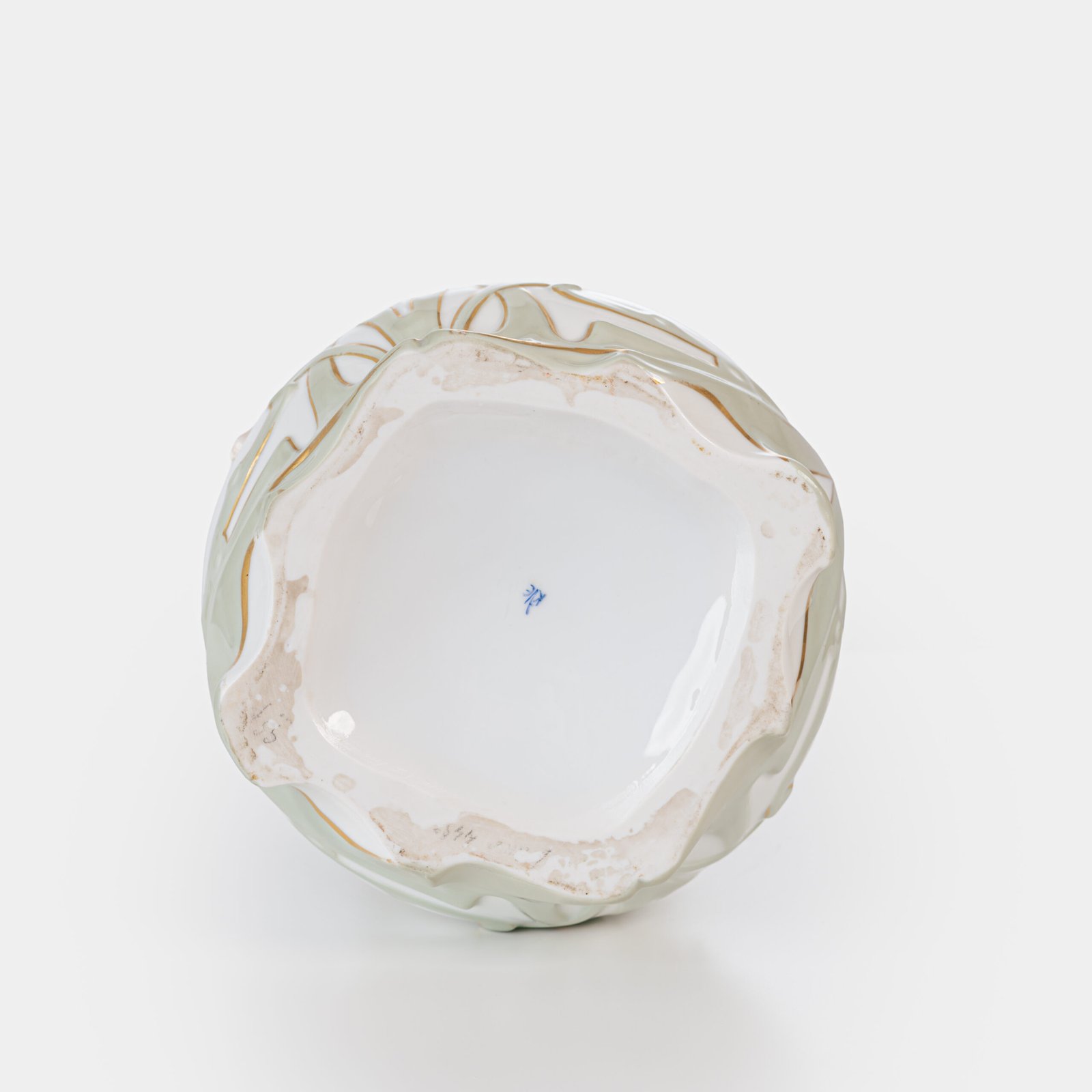 Art Nouveau porcelain vase by Karl Ens, circa 1900, featuring a sculptural composition in high relief with a maiden and cherub, hand-painted with floral details and highlighted with gilding. Marked “KVE” on the base.