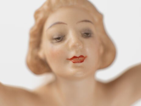 Exquisite Karl Tutter figurine “Sonnenkind” Art Deco porcelain sculpture of a nude young woman balancing on a gilded sphere, Hutschenreuther c.1935–40.