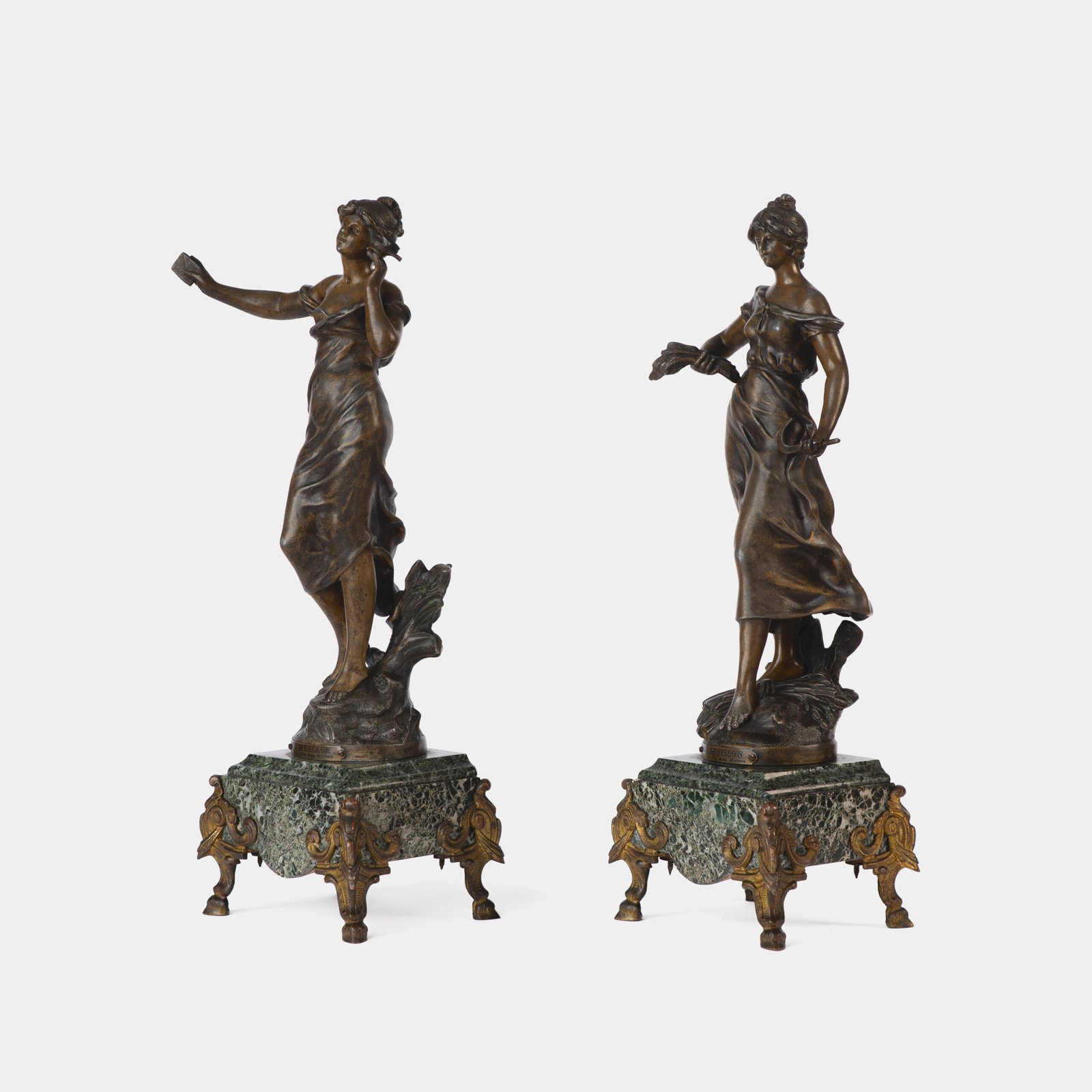 "Pair of Art Nouveau sculptures by Auguste Moreau, La Moisson and Le Message, in zinc with a bronze patina on a marble base, circa 1880-1900."