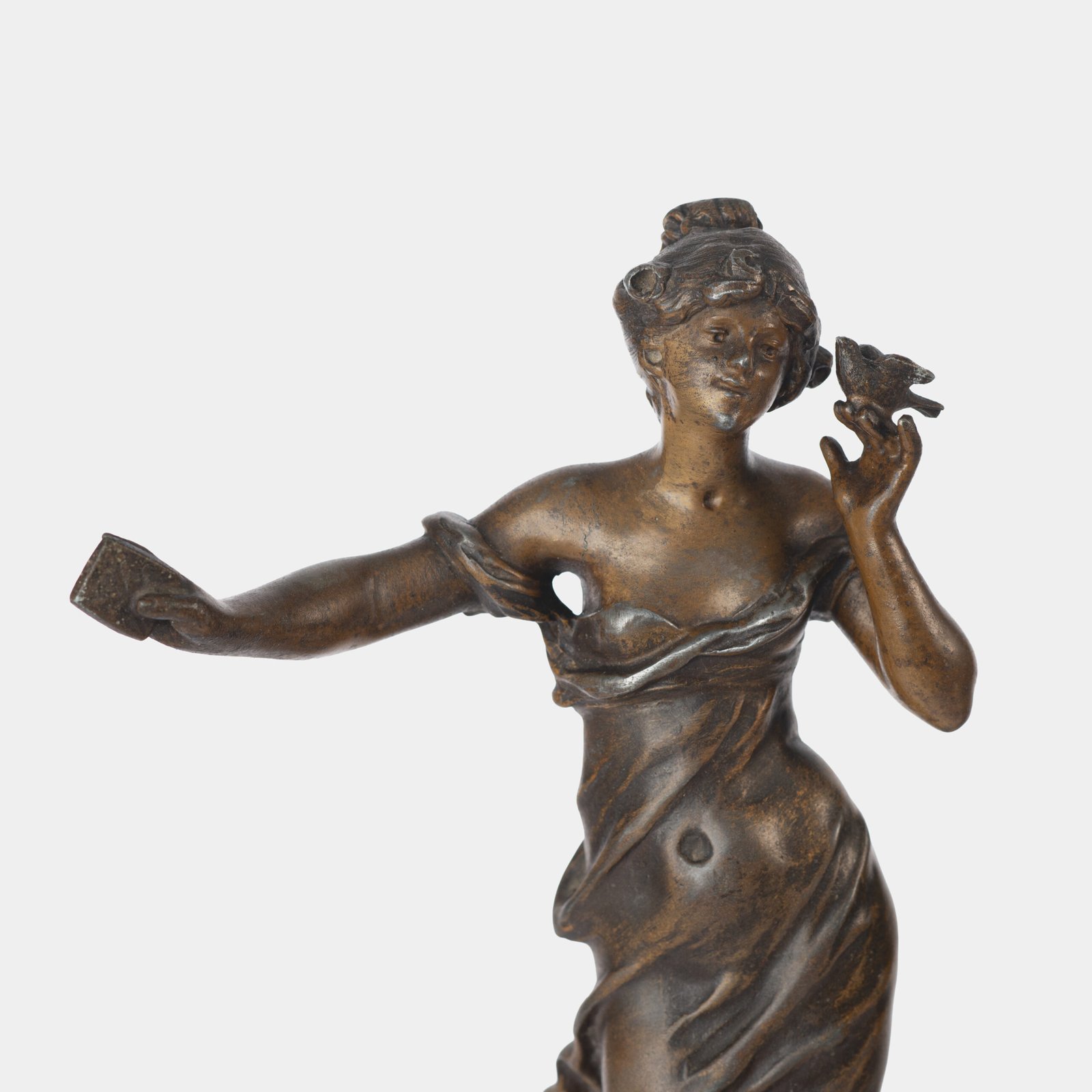 "Pair of Art Nouveau sculptures by Auguste Moreau, La Moisson and Le Message, in zinc with a bronze patina on a marble base, circa 1880-1900."
