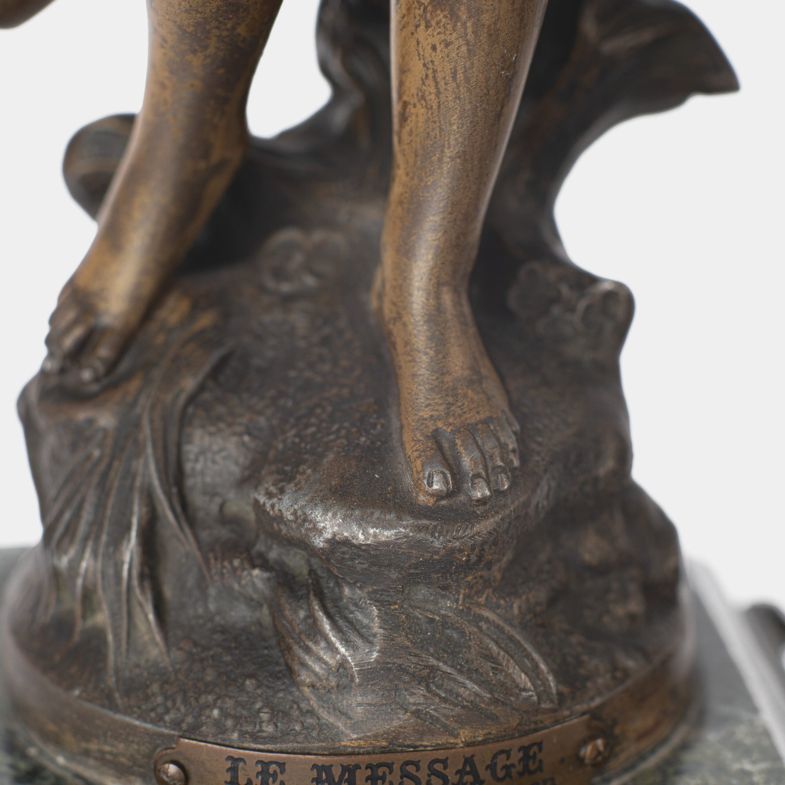 "Pair of Art Nouveau sculptures by Auguste Moreau, La Moisson and Le Message, in zinc with a bronze patina on a marble base, circa 1880-1900."