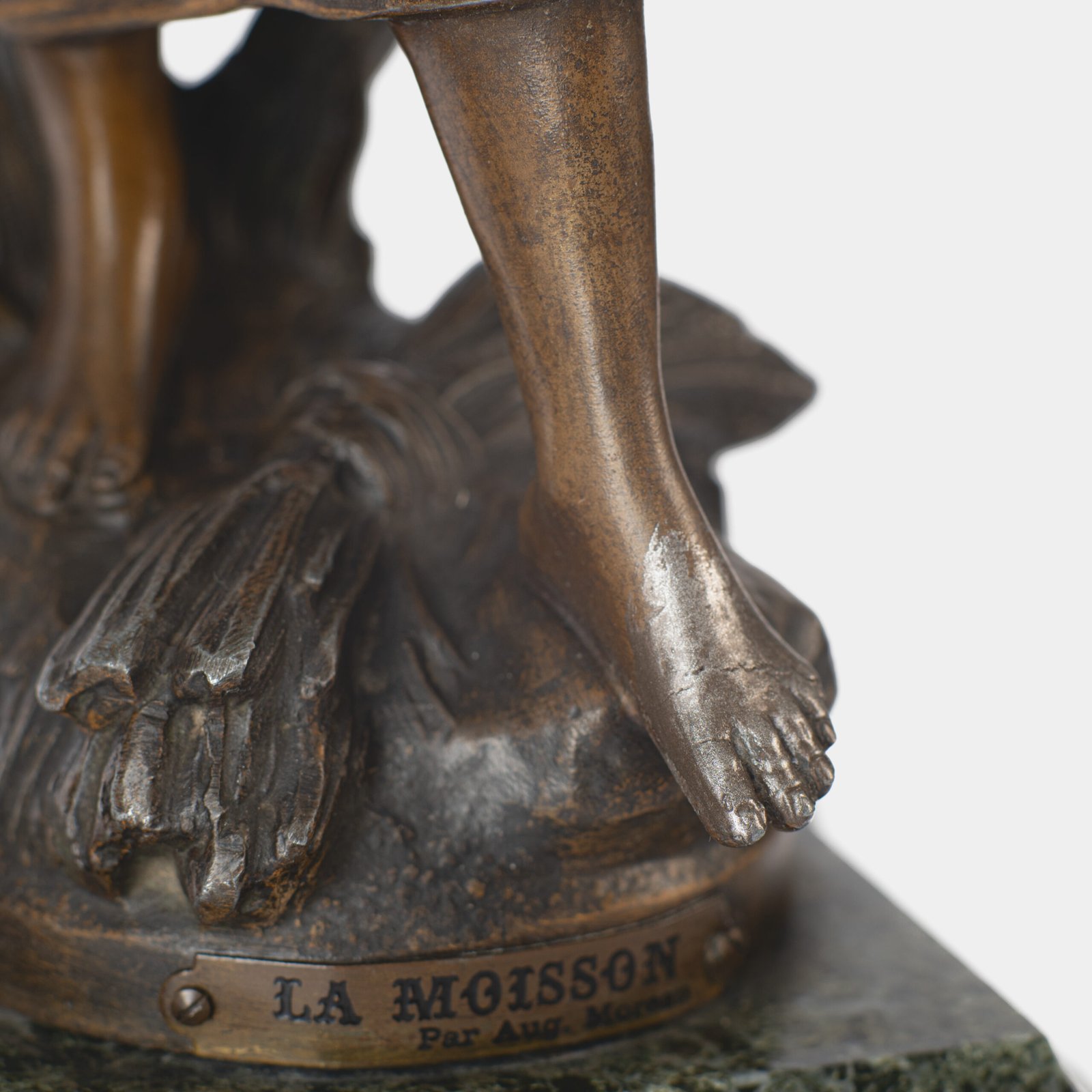 "Pair of Art Nouveau sculptures by Auguste Moreau, La Moisson and Le Message, in zinc with a bronze patina on a marble base, circa 1880-1900."