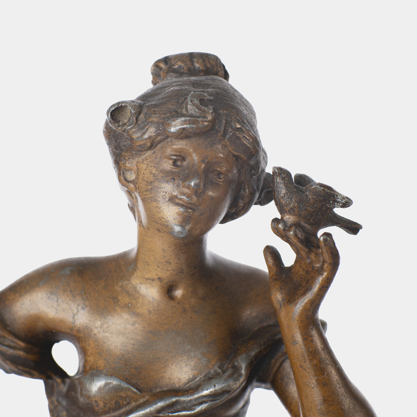 "Pair of Art Nouveau sculptures by Auguste Moreau, La Moisson and Le Message, in zinc with a bronze patina on a marble base, circa 1880-1900."