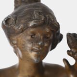 "Pair of Art Nouveau sculptures by Auguste Moreau, La Moisson and Le Message, in zinc with a bronze patina on a marble base, circa 1880-1900."