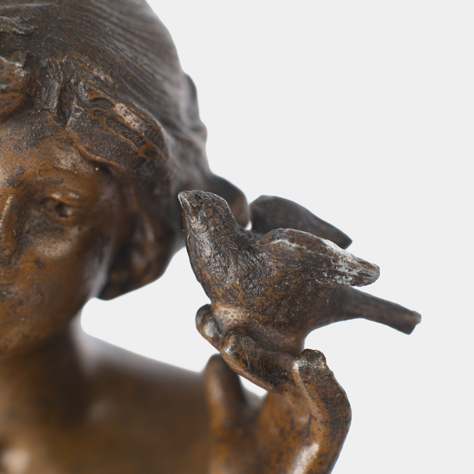 "Pair of Art Nouveau sculptures by Auguste Moreau, La Moisson and Le Message, in zinc with a bronze patina on a marble base, circa 1880-1900."