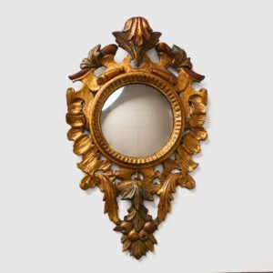 Antique French convex (witch’s eye) mirror, Baroque Revival; hand-carved wooden frame gilded over red bole with evidence of estofado and subtle polychrome accents; original convex glass 8.27 in (21 cm) diameter. Overall size 26.77 in (68 cm) × 14.96 in (38 cm) × 3.15 in (8 cm). Very good vintage condition with authentic patina; ideal for high-end interior design projects, showrooms and private collections.
