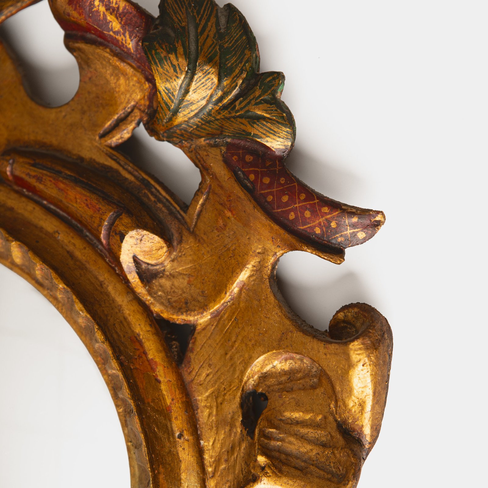 French convex mirror with gilt carved frame and original convex glass (c.1880–1920)