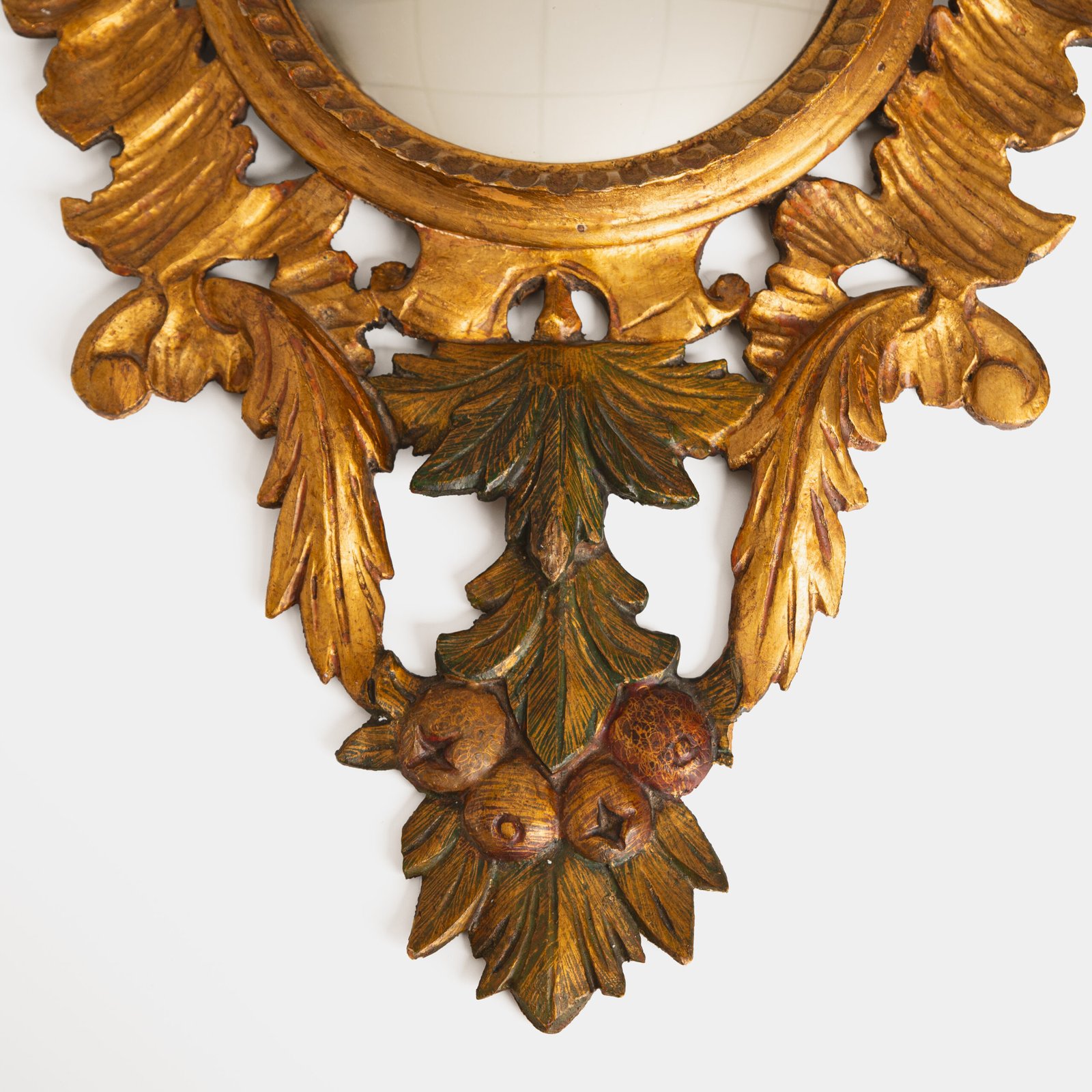 French convex mirror with gilt carved frame and original convex glass (c.1880–1920)