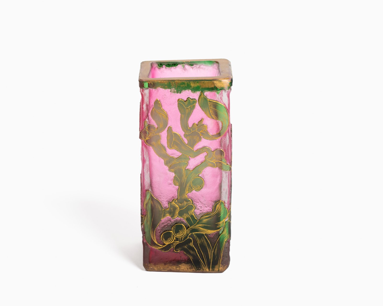 Daum (Nancy) Art Nouveau vase in pink acid-etched (frosted) glass with painted green floral decoration and gold enamel details; signed in gold with the Cross of Lorraine. Dimensions: 4.52 in (11.5 cm) high × 2.16 in (5.5 cm) wide × 2.16 in (5.5 cm) deep. Excellent condition, no chips; representative example of French art-glass production, c. 1900–1920, suitable for collections and interior design projects.