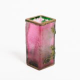 Daum (Nancy) Art Nouveau vase in pink acid-etched (frosted) glass with painted green floral decoration and gold enamel details; signed in gold with the Cross of Lorraine. Dimensions: 4.52 in (11.5 cm) high × 2.16 in (5.5 cm) wide × 2.16 in (5.5 cm) deep. Excellent condition, no chips; representative example of French art-glass production, c. 1900–1920, suitable for collections and interior design projects.