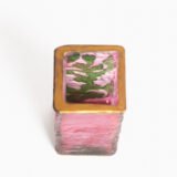 Daum (Nancy) Art Nouveau vase in pink acid-etched (frosted) glass with painted green floral decoration and gold enamel details; signed in gold with the Cross of Lorraine. Dimensions: 4.52 in (11.5 cm) high × 2.16 in (5.5 cm) wide × 2.16 in (5.5 cm) deep. Excellent condition, no chips; representative example of French art-glass production, c. 1900–1920, suitable for collections and interior design projects.