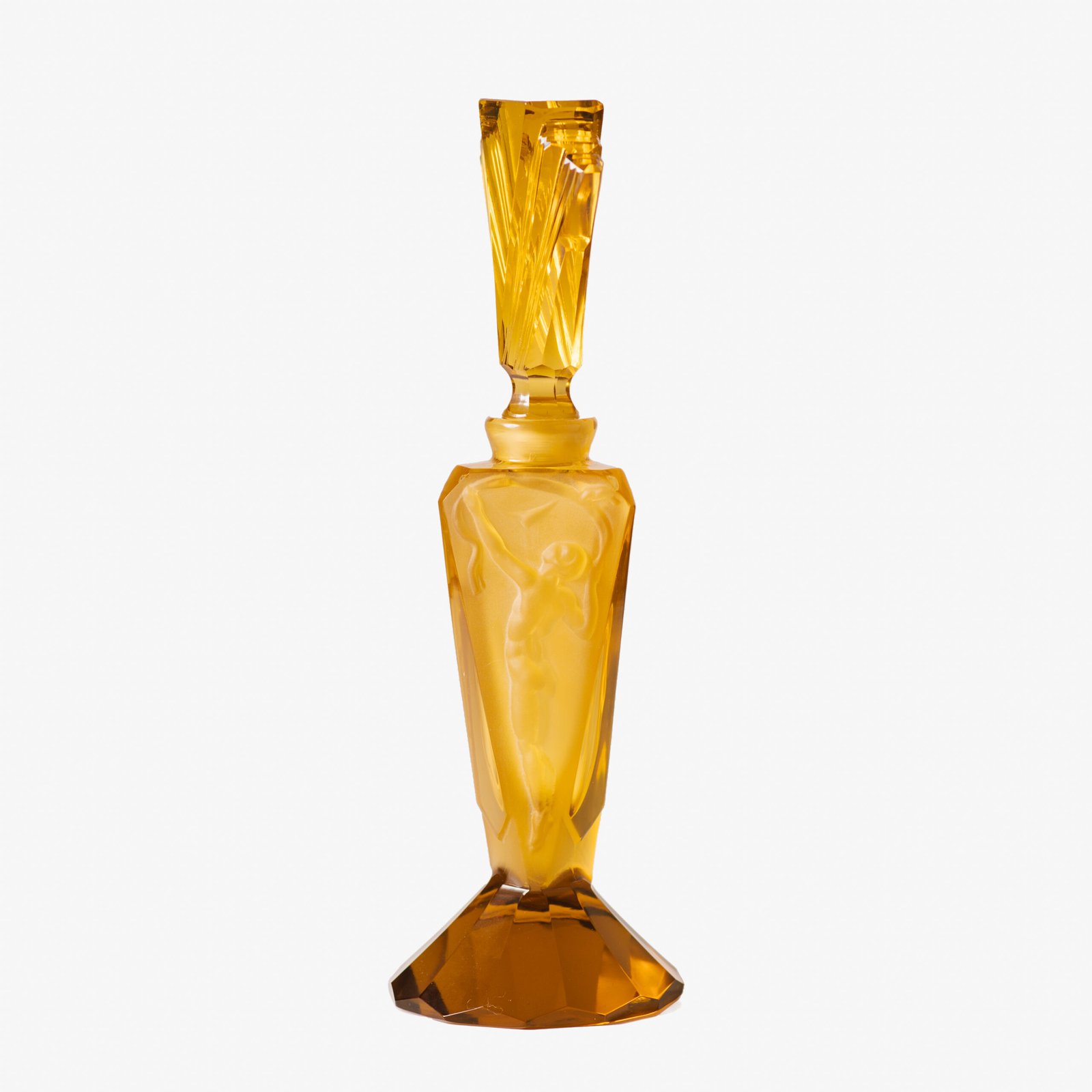 Large German Art Deco perfume bottle in satin-finished pressed amber glass, c. 1930, with figurative relief panels of nude female figures in different poses, faceted geometric base and tall fan-shaped stopper; height 29 cm / 11.42 in, width 9.5 cm / 3.74 in.