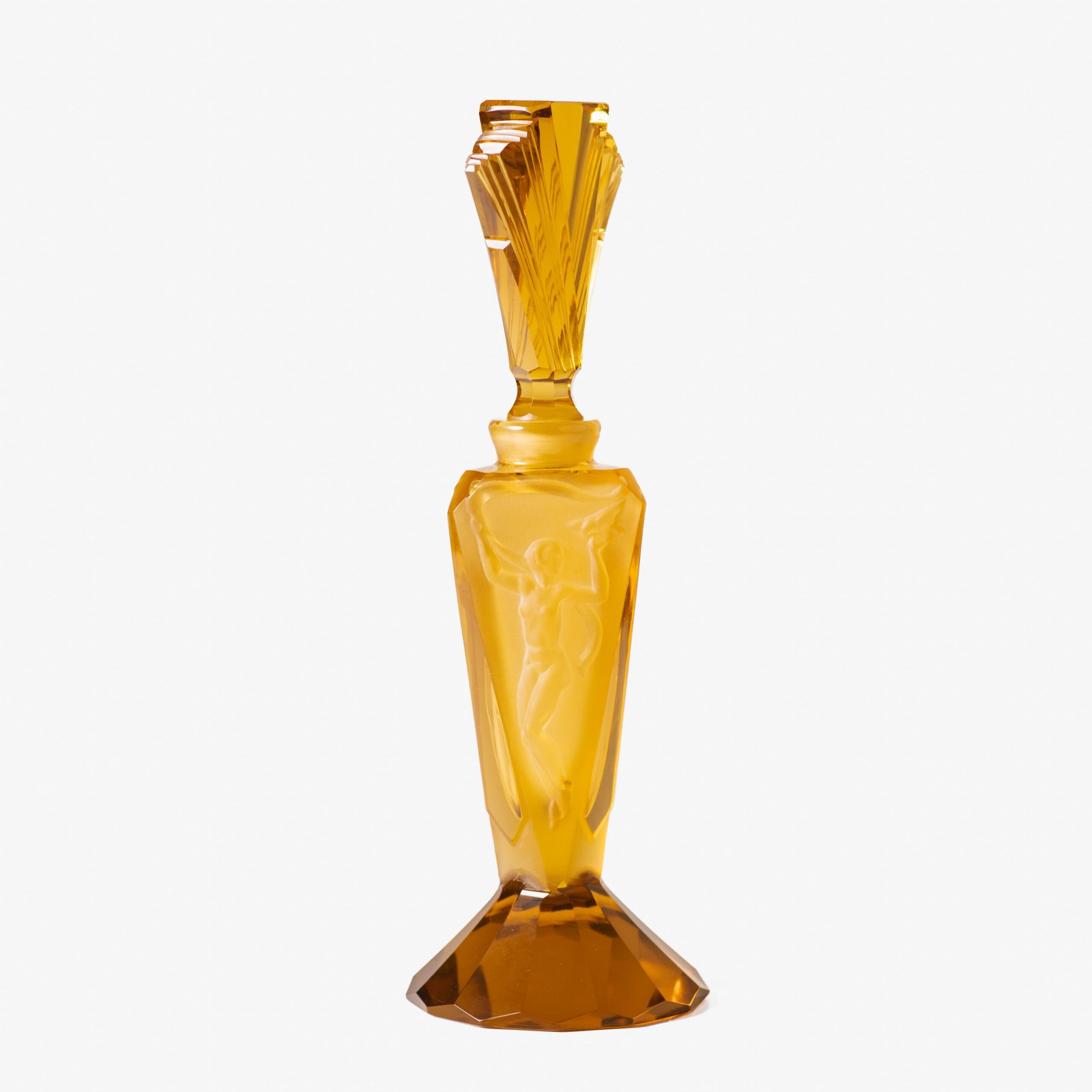 Large German Art Deco perfume bottle in satin-finished pressed amber glass, c. 1930, with figurative relief panels of nude female figures in different poses, faceted geometric base and tall fan-shaped stopper; height 29 cm / 11.42 in, width 9.5 cm / 3.74 in.