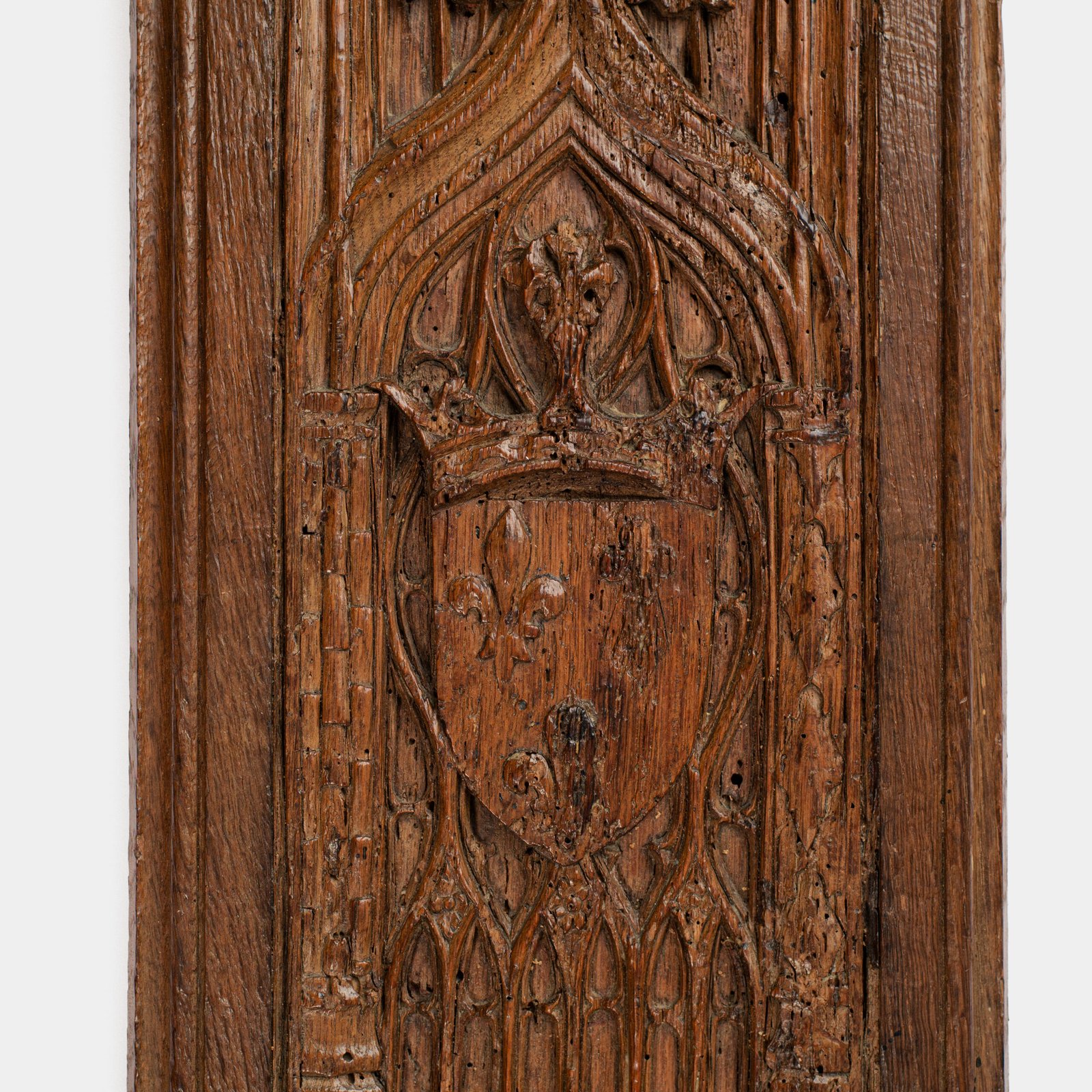 Historic Gothic oak relief with crowned fleur-de-lis arms of Anne de Bretagne, Flamboyant carving c.1495–1510, original patina.