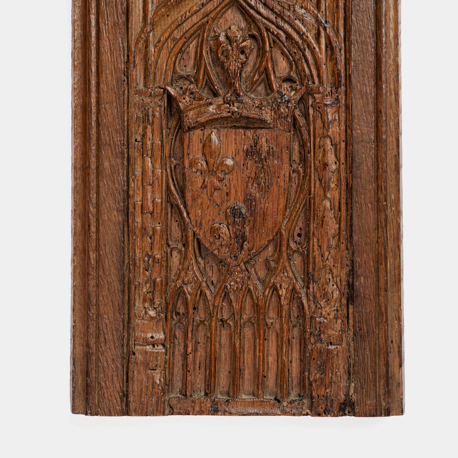 Historic Gothic oak relief with crowned fleur-de-lis arms of Anne de Bretagne, Flamboyant carving c.1495–1510, original patina.