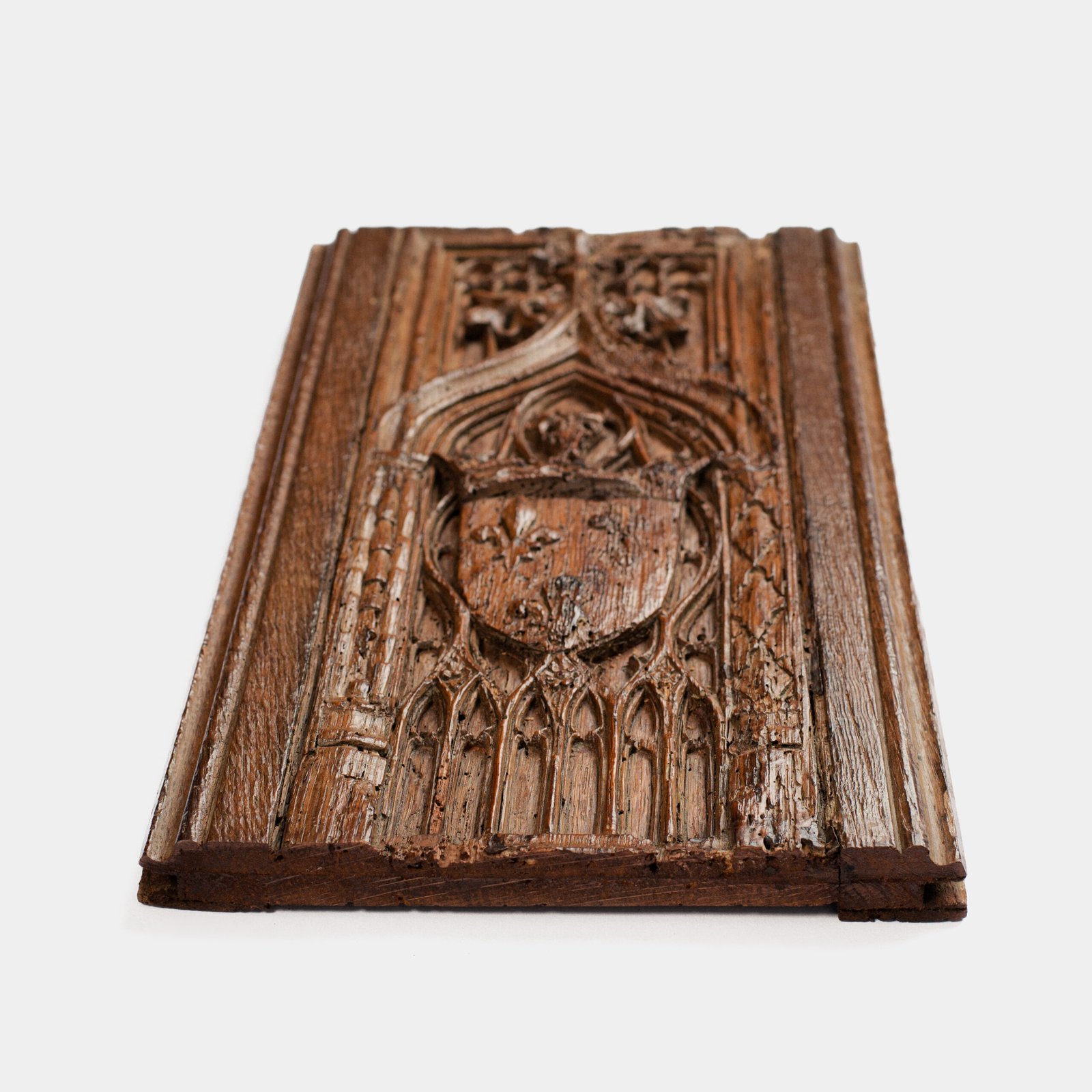 Historic Gothic oak relief with crowned fleur-de-lis arms of Anne de Bretagne, Flamboyant carving c.1495–1510, original patina.