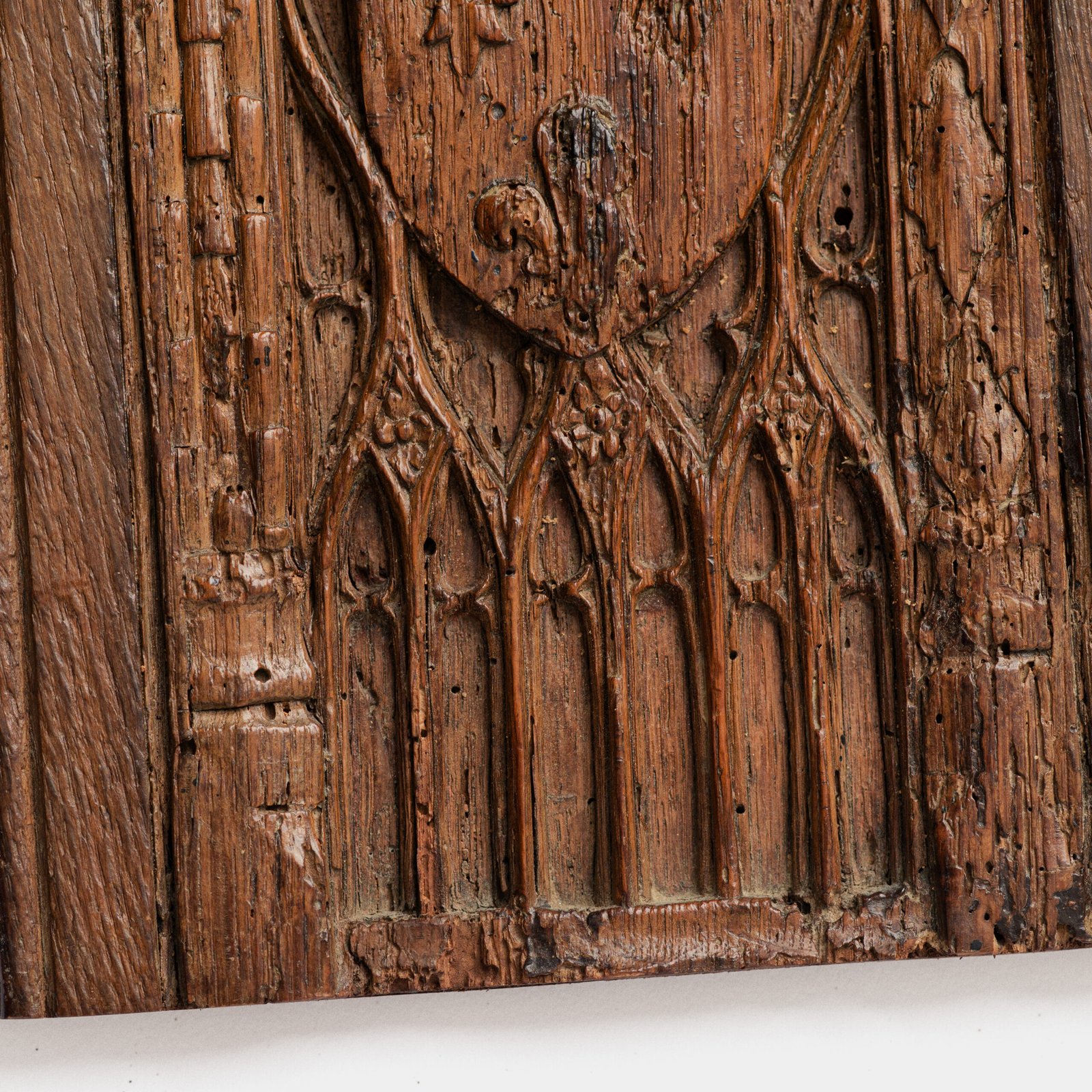 Historic Gothic oak relief with crowned fleur-de-lis arms of Anne de Bretagne, Flamboyant carving c.1495–1510, original patina.
