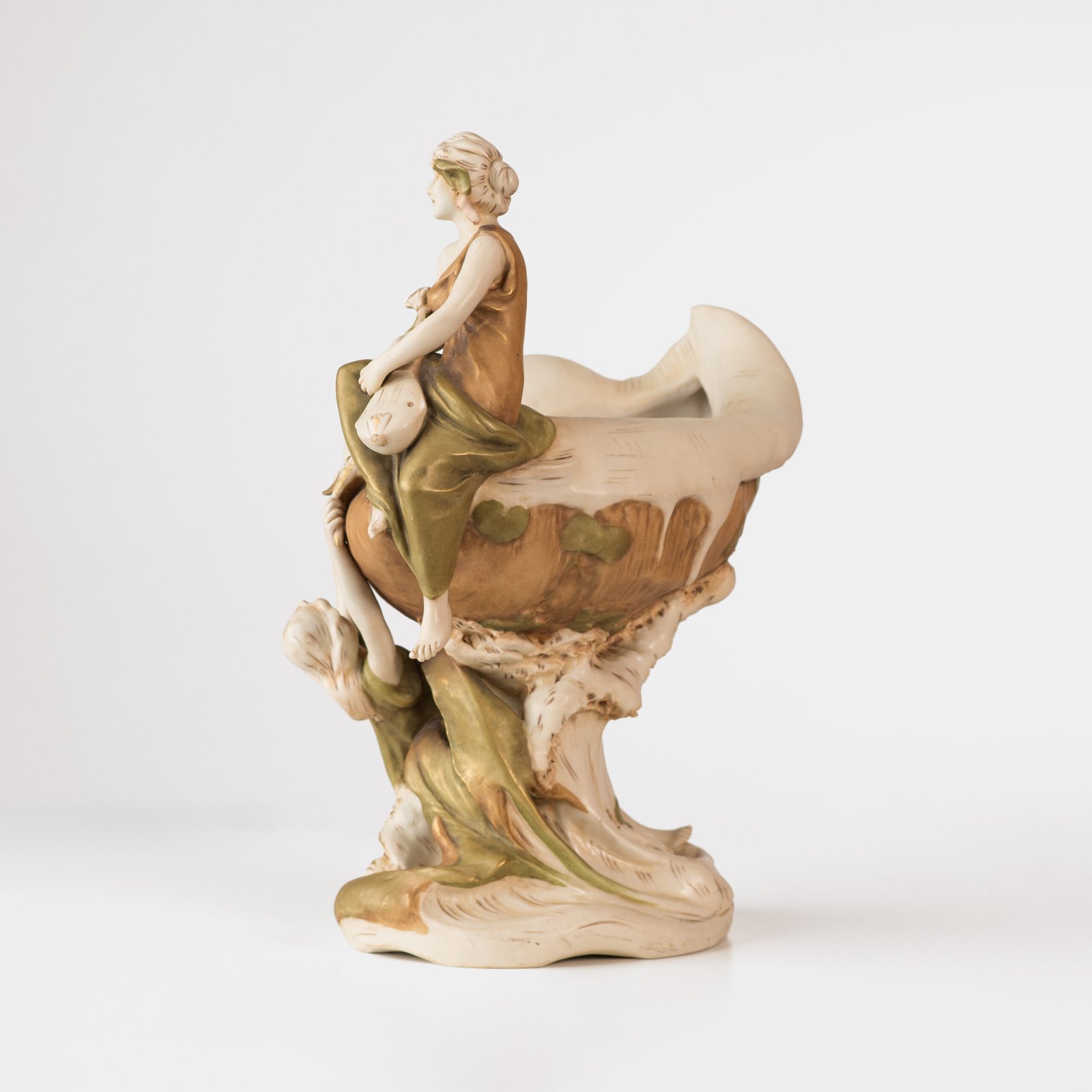 Magnificent Royal Dux Bohemia Art Nouveau porcelain centerpiece with two nymphs and organic lobed bowl, marked with the pink triangle and “E” for Eduard Eichler, ca. 1905–1918.