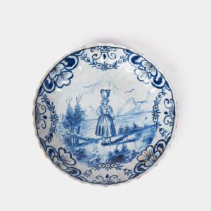 Rare 17th-century Delft blue plate by Adriaen Kocks, ca. 1686–1700, cabinet plate with finely painted rural female figure, signed AK.