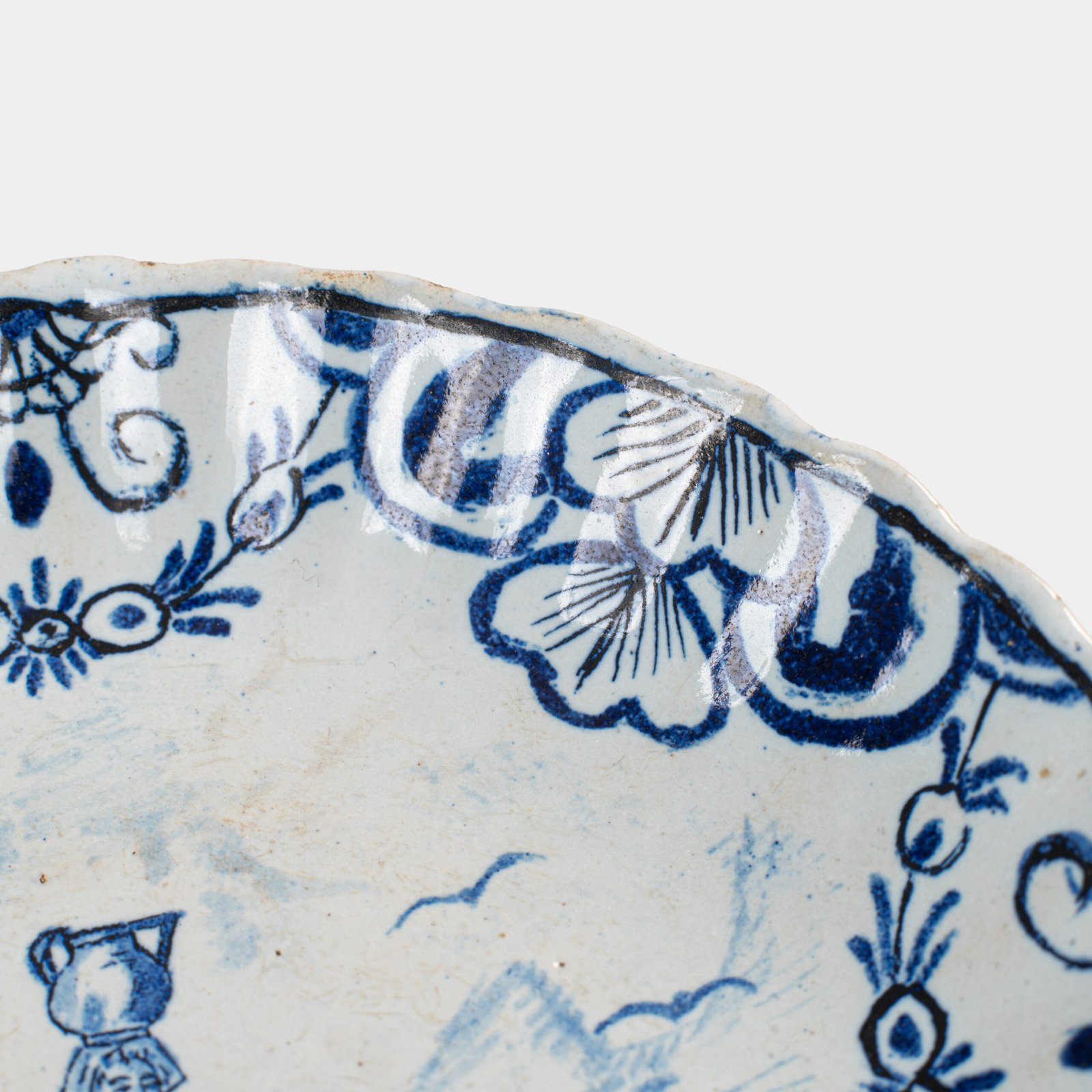 Rare 17th-century Delft blue plate by Adriaen Kocks, ca. 1686–1700, cabinet plate with finely painted rural female figure, signed AK.