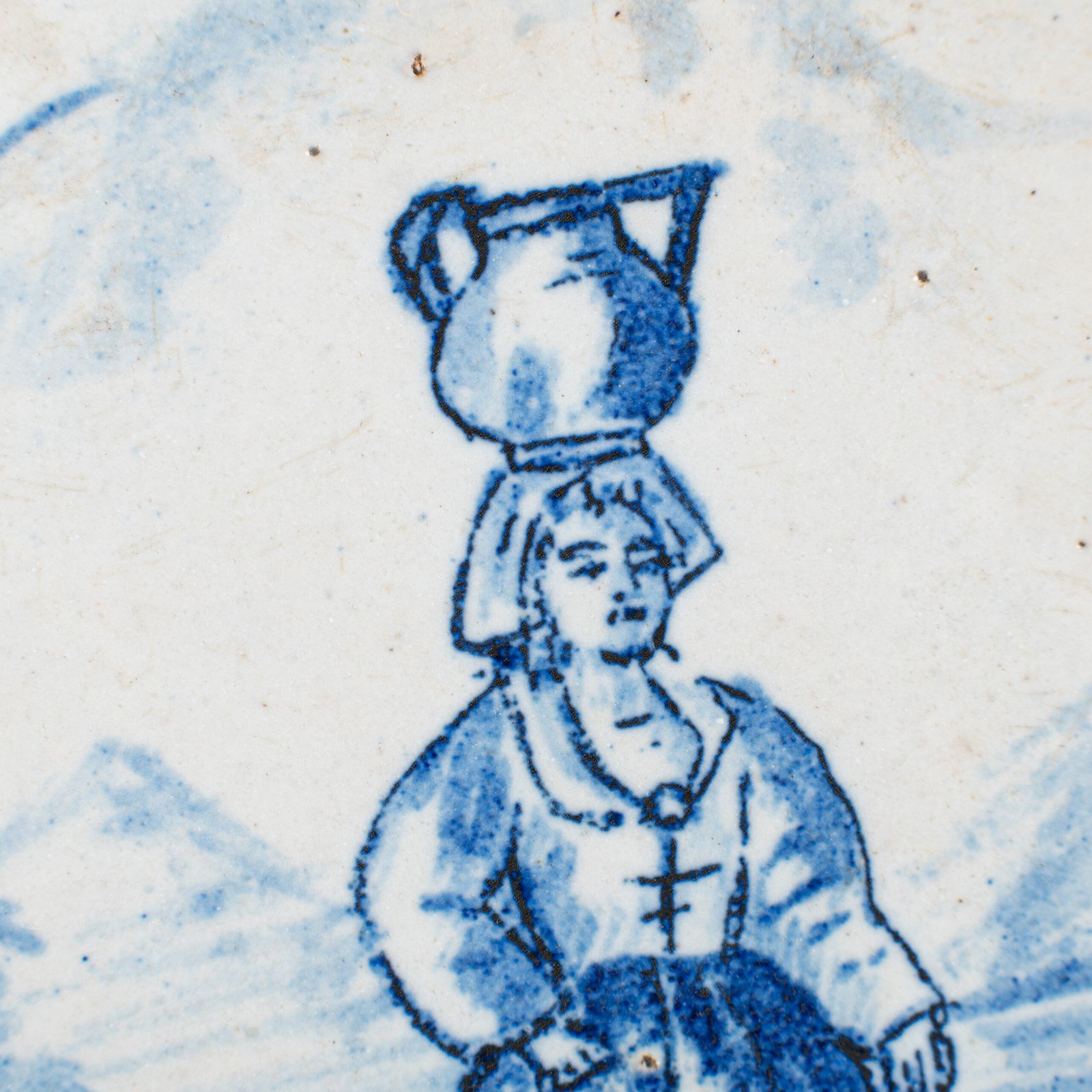 Rare 17th-century Delft blue plate by Adriaen Kocks, ca. 1686–1700, cabinet plate with finely painted rural female figure, signed AK.