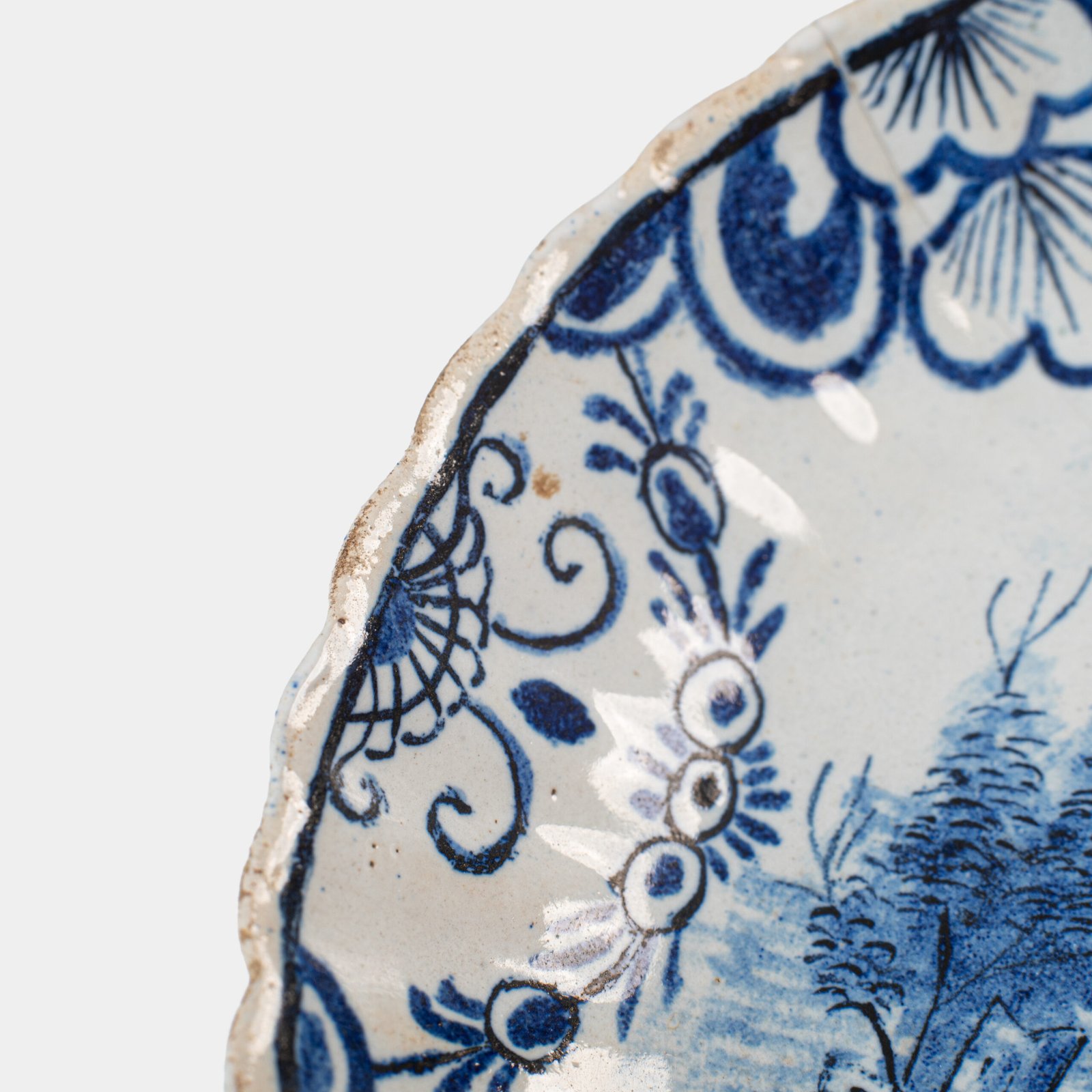 Rare 17th-century Delft blue plate by Adriaen Kocks, ca. 1686–1700, cabinet plate with finely painted rural female figure, signed AK.