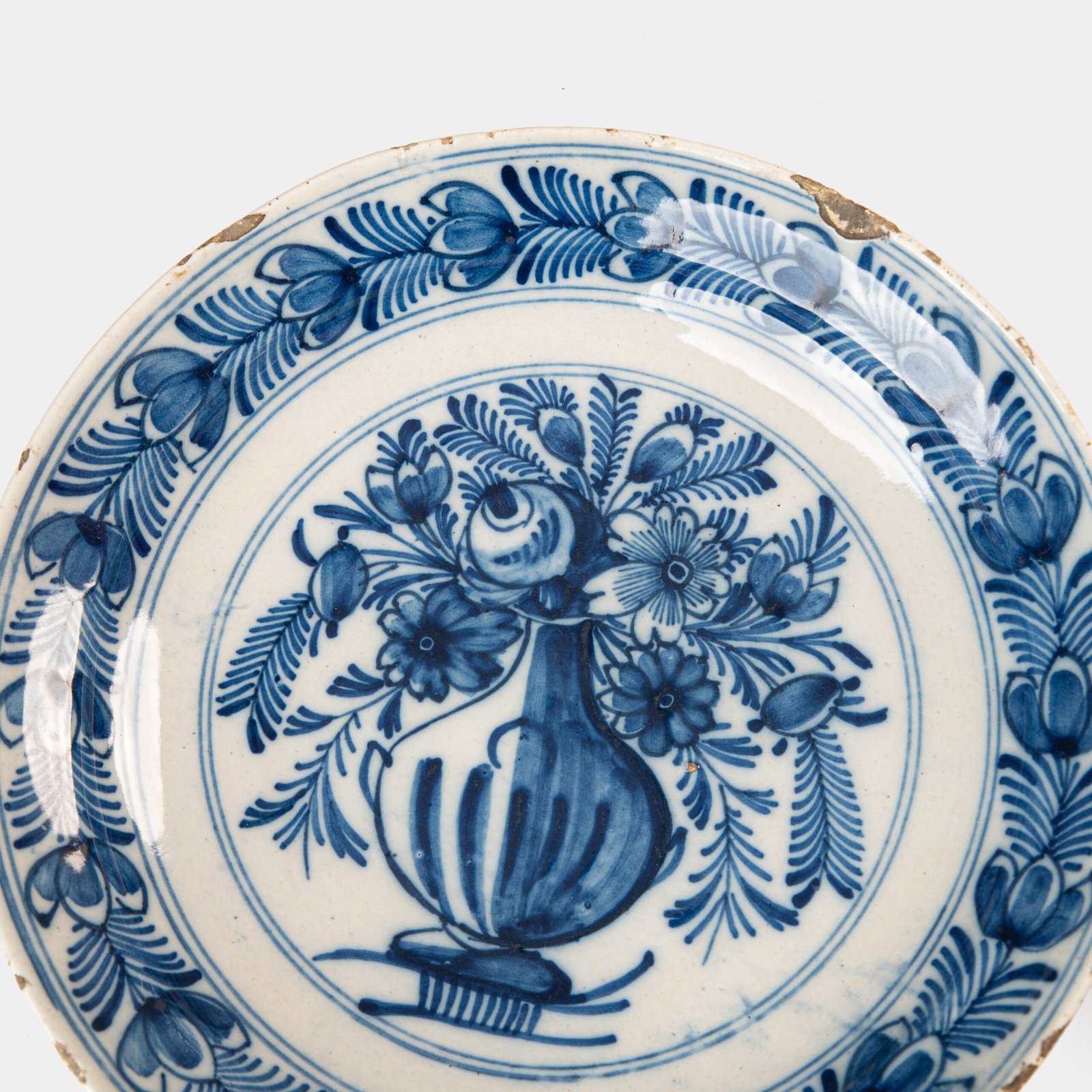 Delft blue plates – antique hand-painted Delftware pair, 18th century