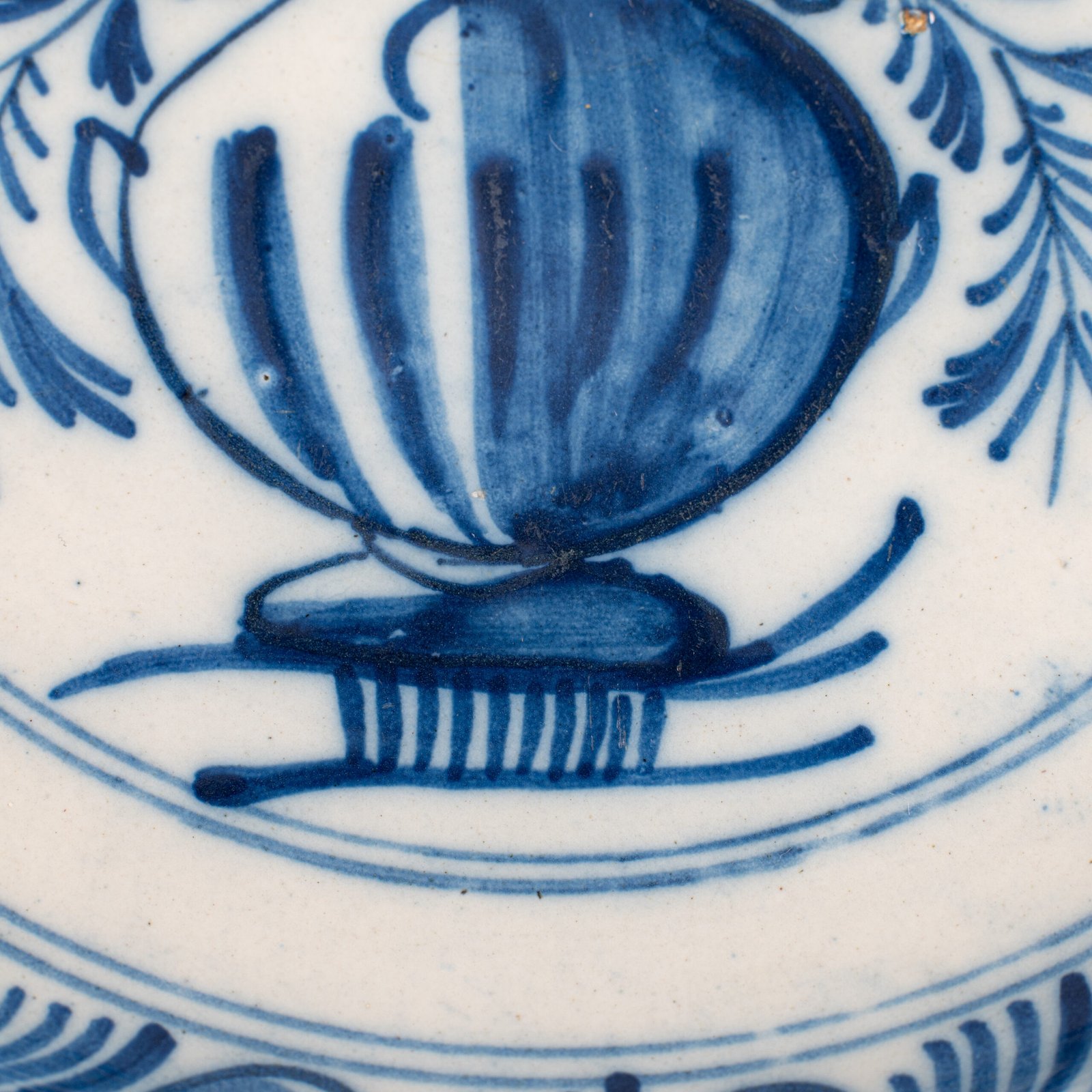 Delft blue plates – antique hand-painted Delftware pair, 18th century
