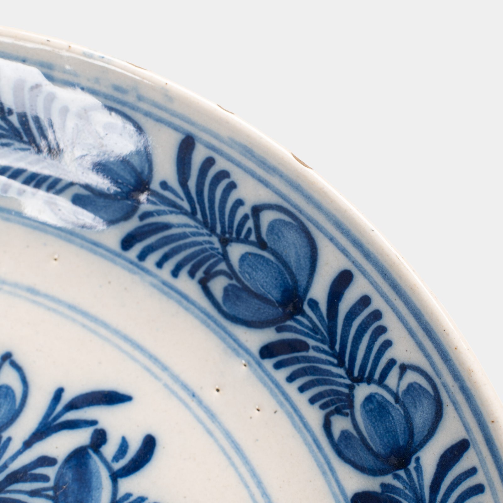 Delft blue plates – antique hand-painted Delftware pair, 18th century