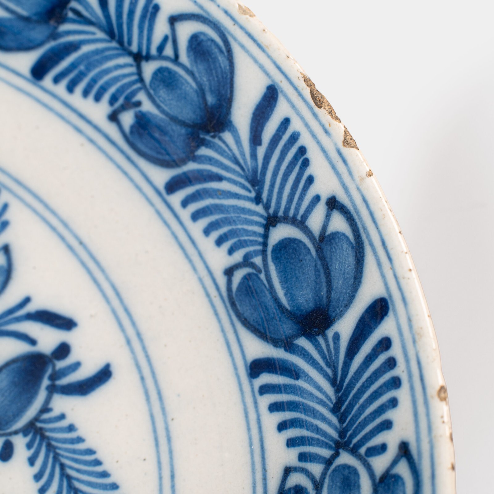 Delft blue plates – antique hand-painted Delftware pair, 18th century