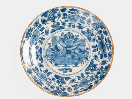 Exceptional 18th century Delft blue and white bowl-shaped plate with floral basket decoration, ca. 1700–1740, Dutch tin-glazed earthenware